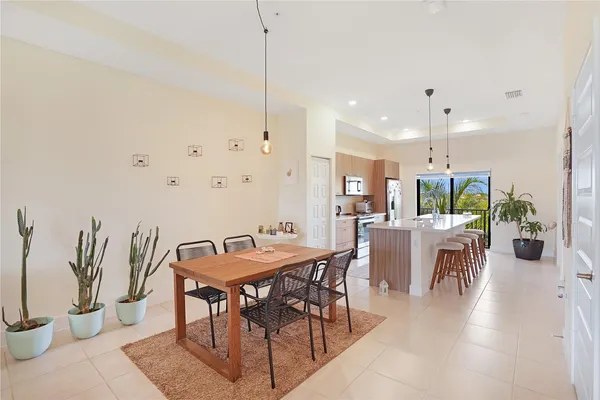 a view of a dining room with furniture