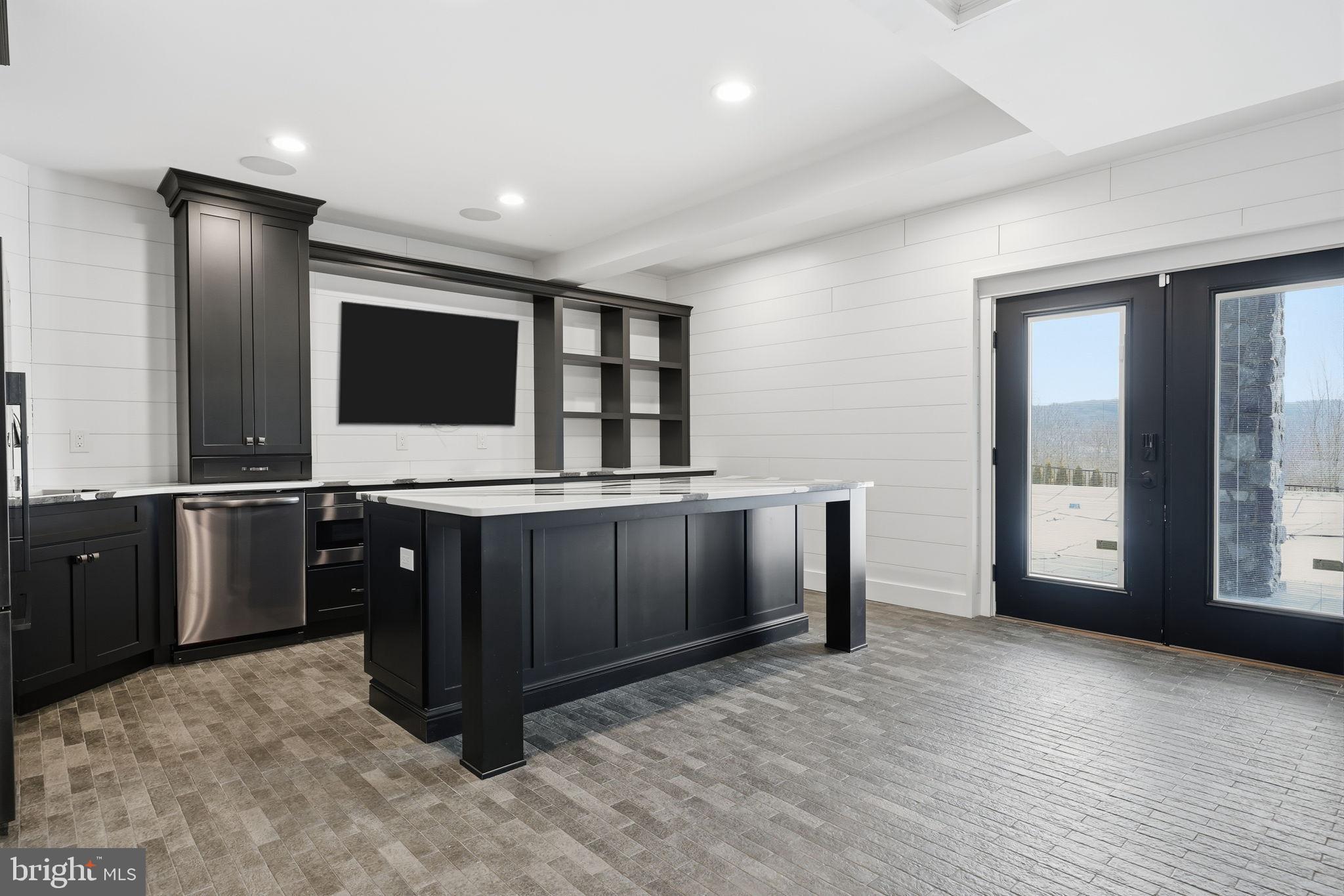 176 Fenstermaker Road Kutztown, PA 19530 - Photo 75 of 149 Modern kitchen with sleek black cabinetry.