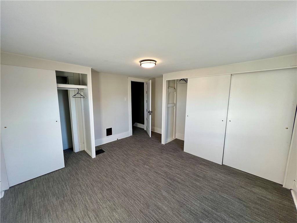142 Alexander Avenue Strabane, PA 15363 - Photo 18 of 25 a view of empty room with wooden floor