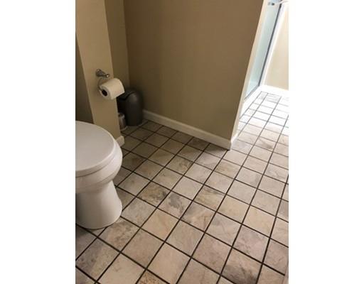 398 Maple Road Longmeadow, MA 01106 - Photo 16 of 18 a bathroom with a toilet and a rug