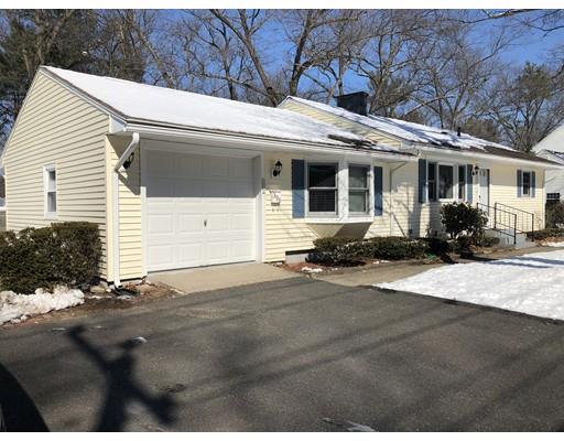 398 Maple Road Longmeadow, MA 01106 - Photo 2 of 18 a front view of a house with a yard