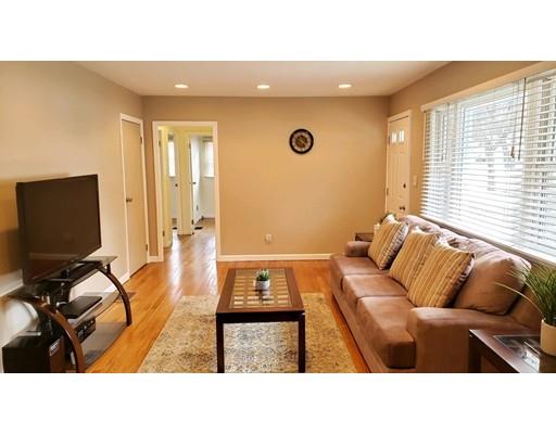 398 Maple Road Longmeadow, MA 01106 - Photo 3 of 18 a living room with furniture and a flat screen tv