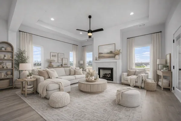 a living room with furniture and a fireplace