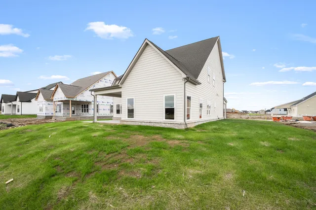 a view of a house with a big yard