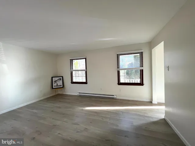 an empty room with windows