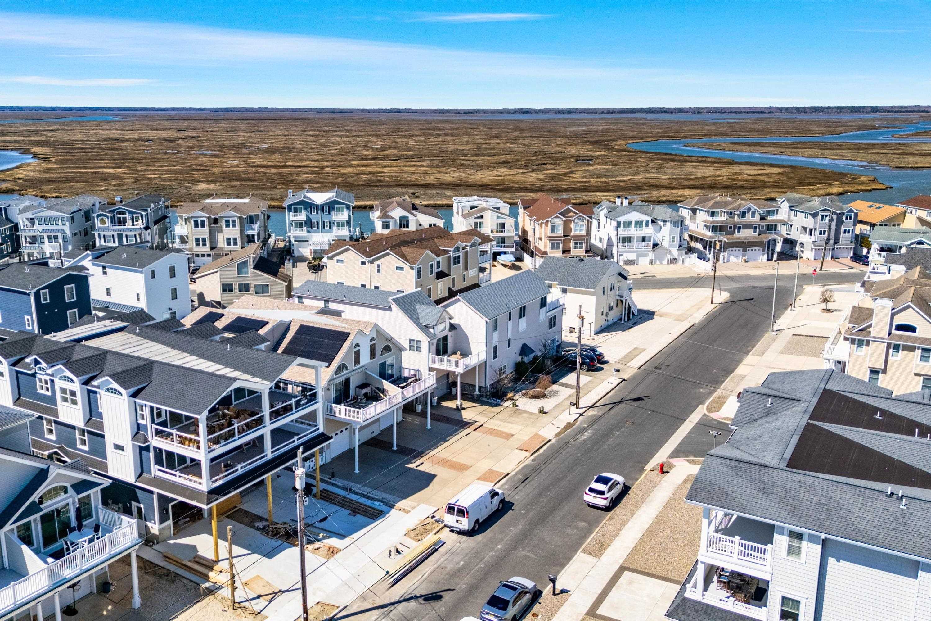 242 57th Street, Unit WEST Sea Isle City, NJ 08243 - Photo 16 of 20 a view of city with ocean view