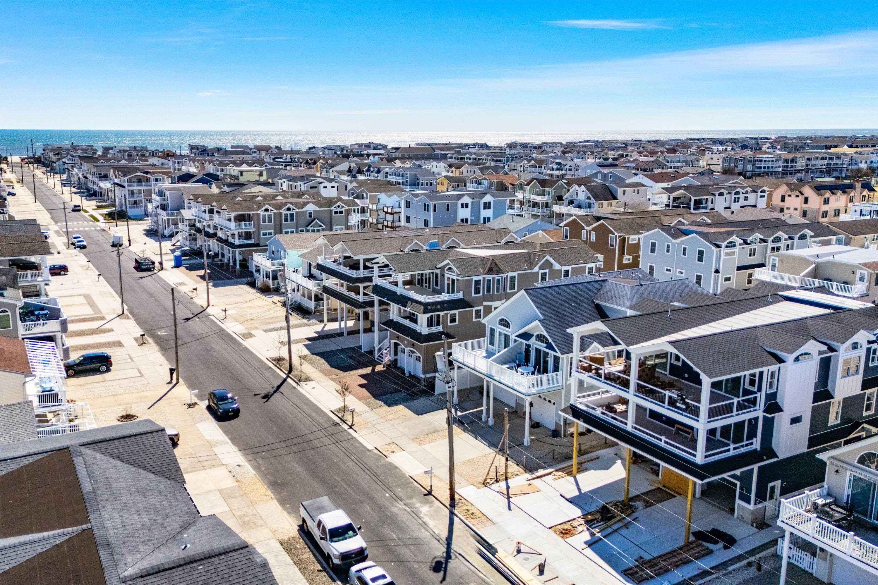 242 57th Street, Unit WEST Sea Isle City, NJ 08243 - Photo 2 of 20 a view of a city