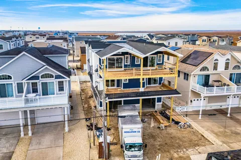 a front view of a building with a street