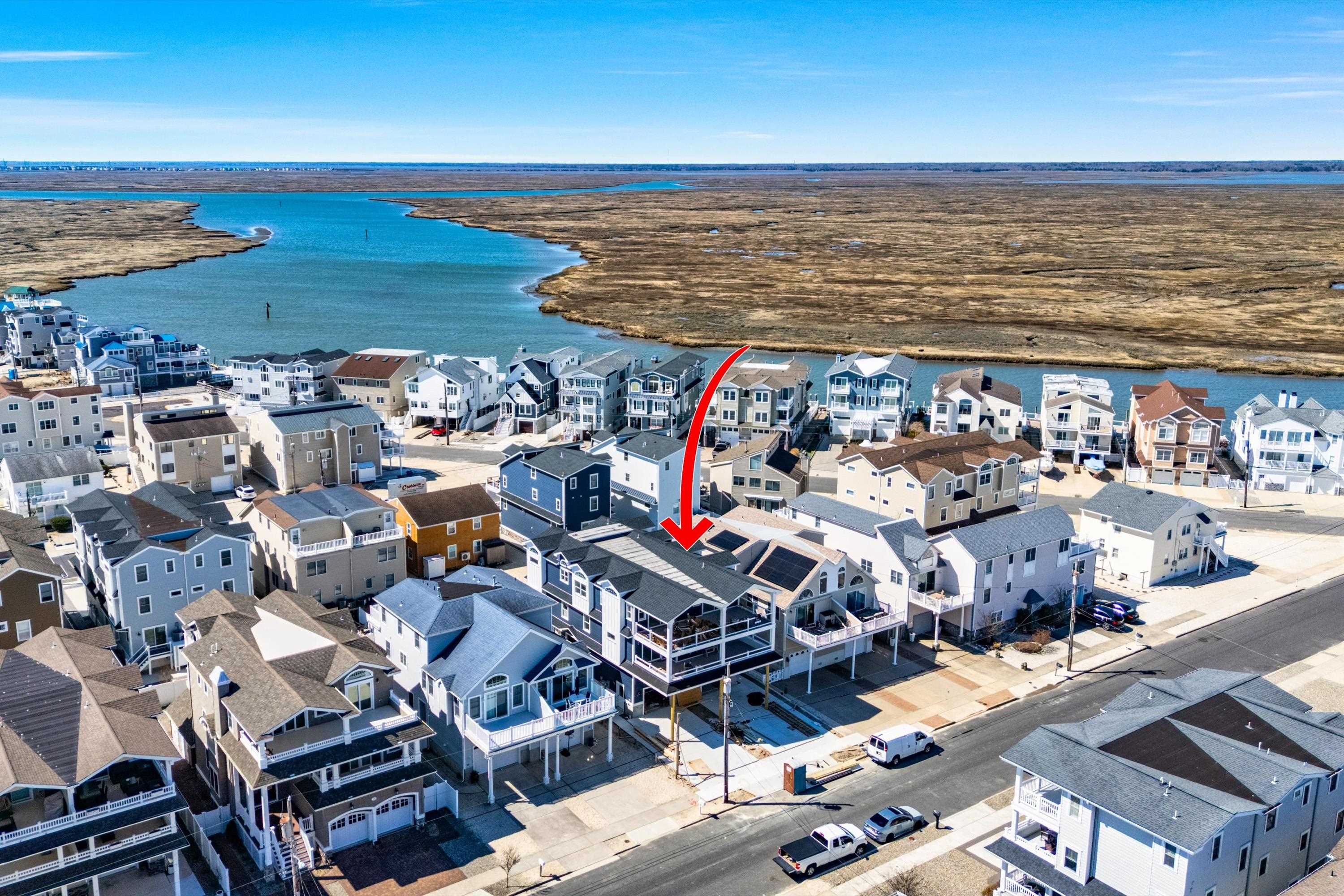 242 57th Street, Unit WEST Sea Isle City, NJ 08243 - Photo 6 of 20 a view of city and ocean