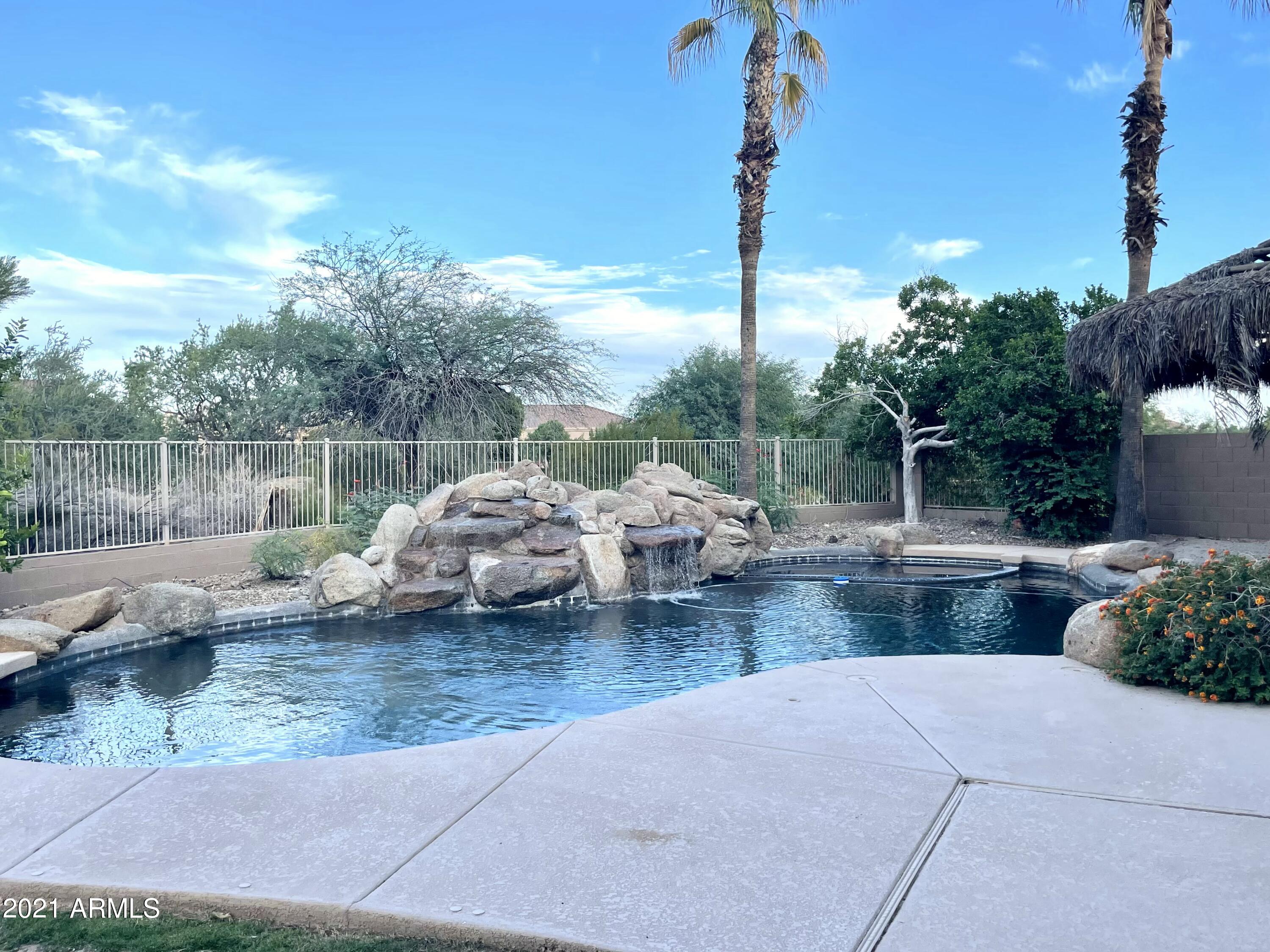 1608 West Amberwood Drive Phoenix, AZ 85045 - Photo 13 of 13 a view of a backyard with sitting area