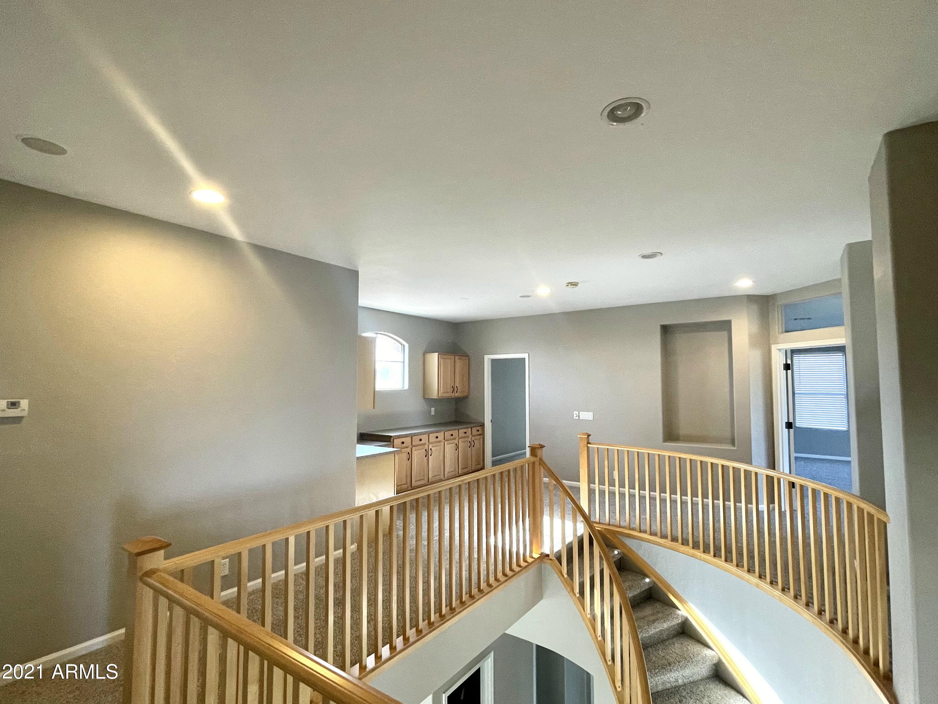 1608 West Amberwood Drive Phoenix, AZ 85045 - Photo 10 of 13 a view of entryway with stairs