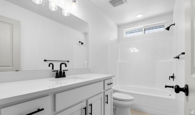 2415 North Ribe Lane Lehi, UT 84048 - Photo 11 of 17 Full bath featuring vanity, bathing tub / shower combination, and light tile patterned floors