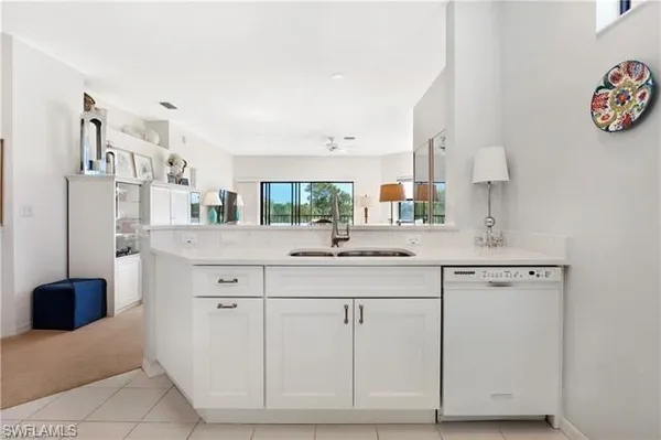 a bathroom with a sink vanity and a mirror