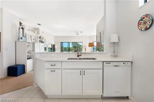 a bathroom with a sink vanity and a mirror