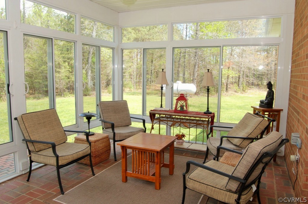 11912 Winterpock Road Chesterfield, VA 23838 - Photo 3 of 24 a living room with furniture and a floor to ceiling windows