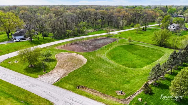 a view of a golf course with a park