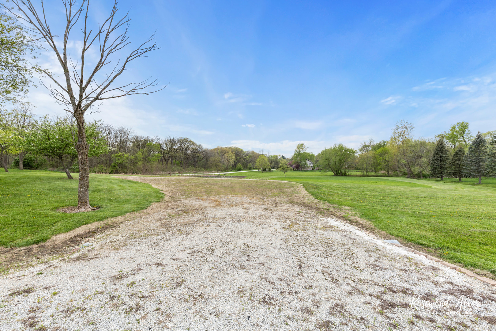 5456 West Heatherbrook Trail Monee, IL 60449 - Photo 7 of 9 a view of a lake with a big yard