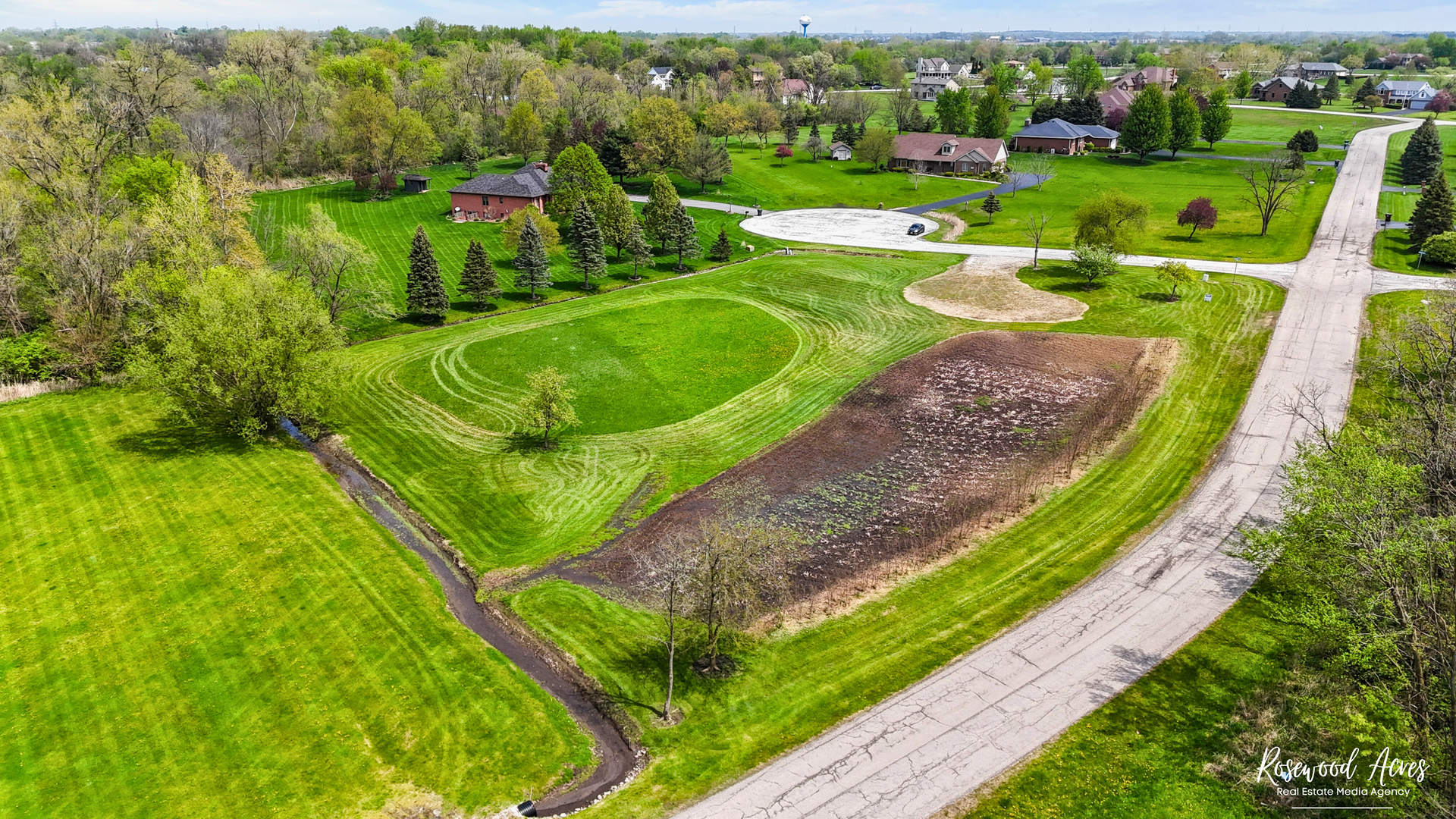 5456 West Heatherbrook Trail Monee, IL 60449 - Photo 8 of 9 a view of a park with large trees