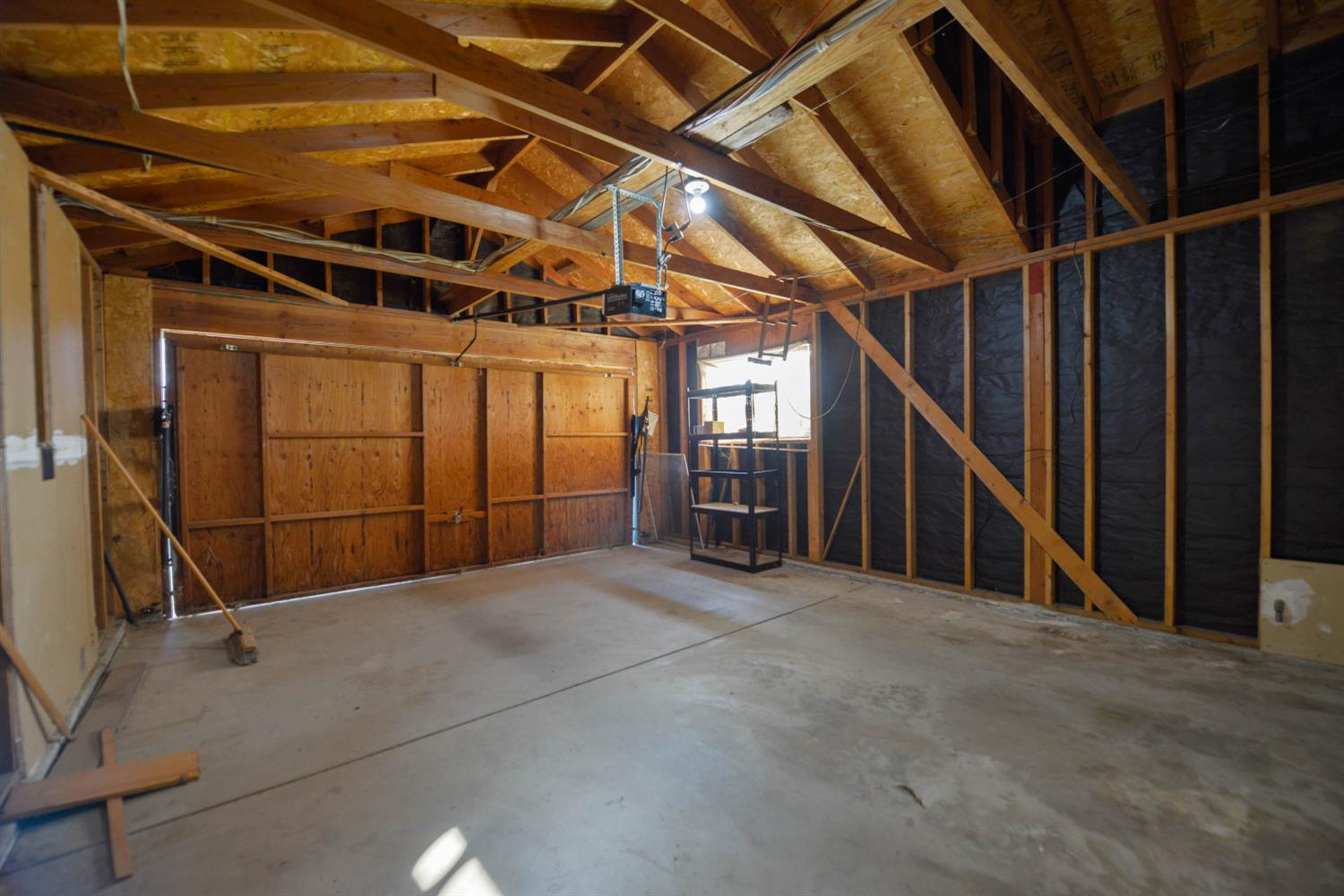 5572 West Sample Avenue Fresno, CA 93722 - Photo 42 of 42 a view of an empty room with wooden floor
