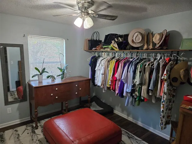 a bed room with a bed and a window