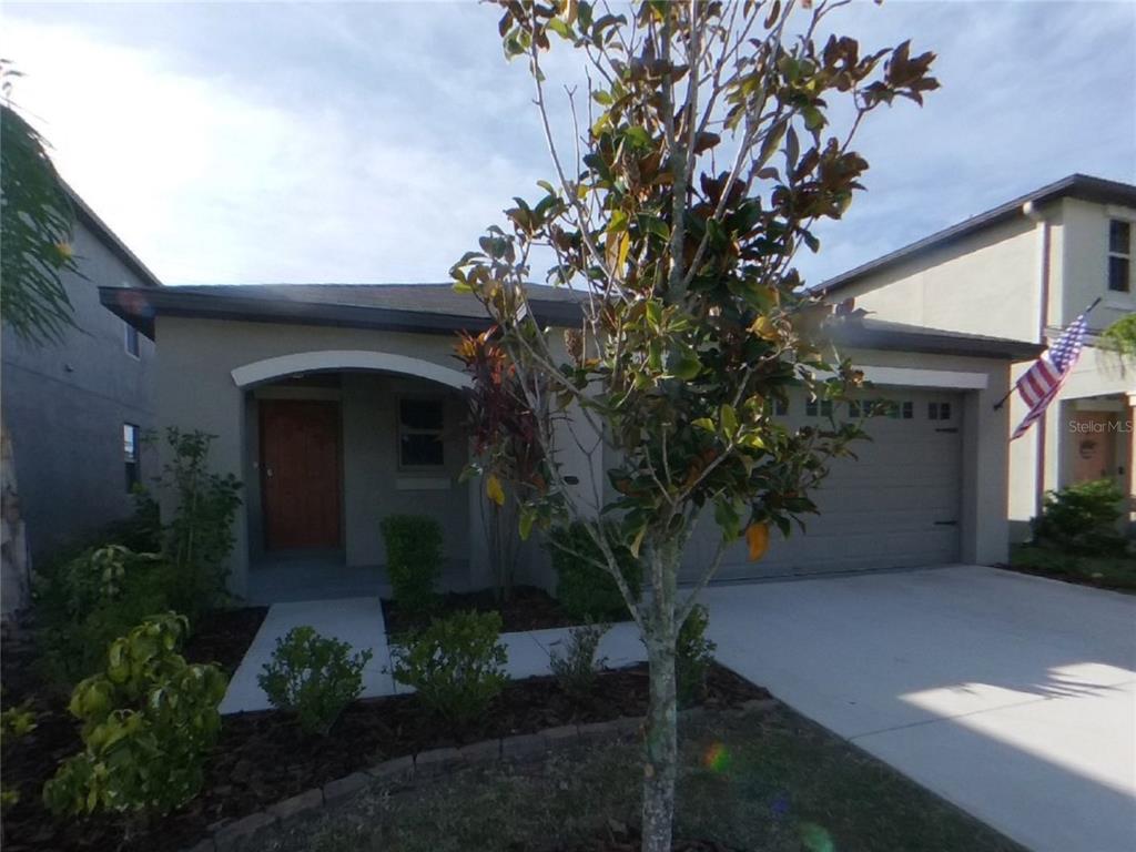 Undisclosed Address Apollo Beach, FL 33572 - Photo 1 of 15 a view of a house with a tree