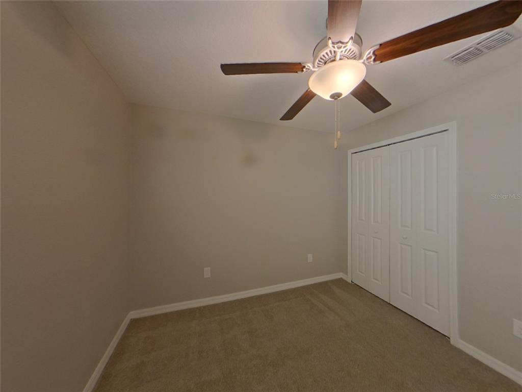 Undisclosed Address Apollo Beach, FL 33572 - Photo 12 of 15 a view of a chandelier fan in a room