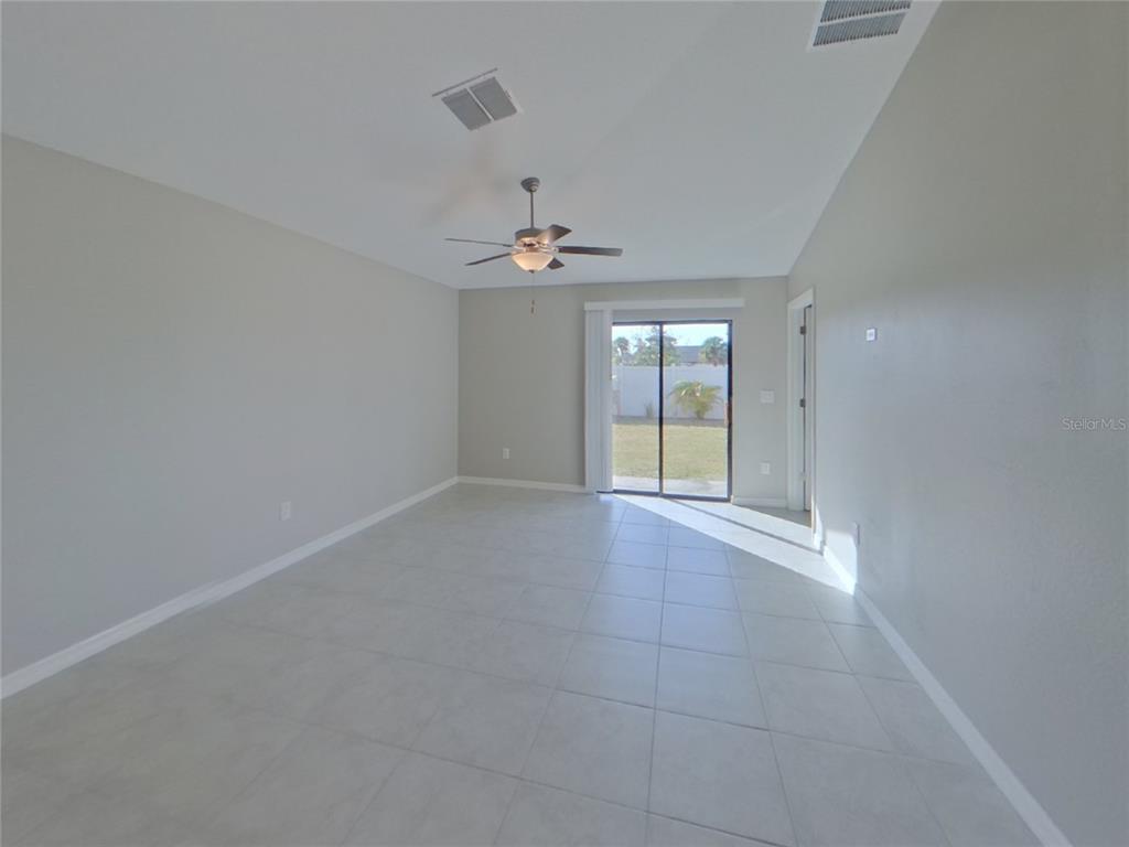 Undisclosed Address Apollo Beach, FL 33572 - Photo 2 of 15 a view of an empty room with a window