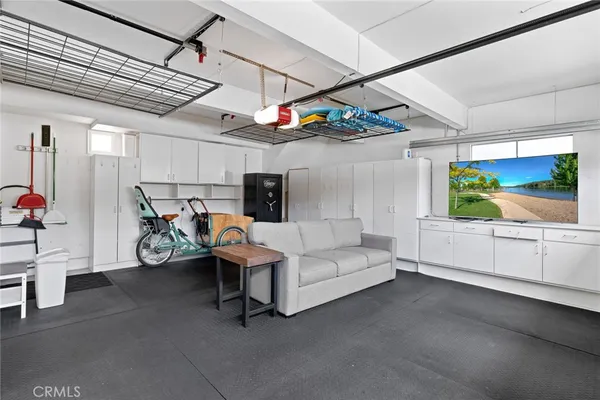 a view of entryway with furniture and a window