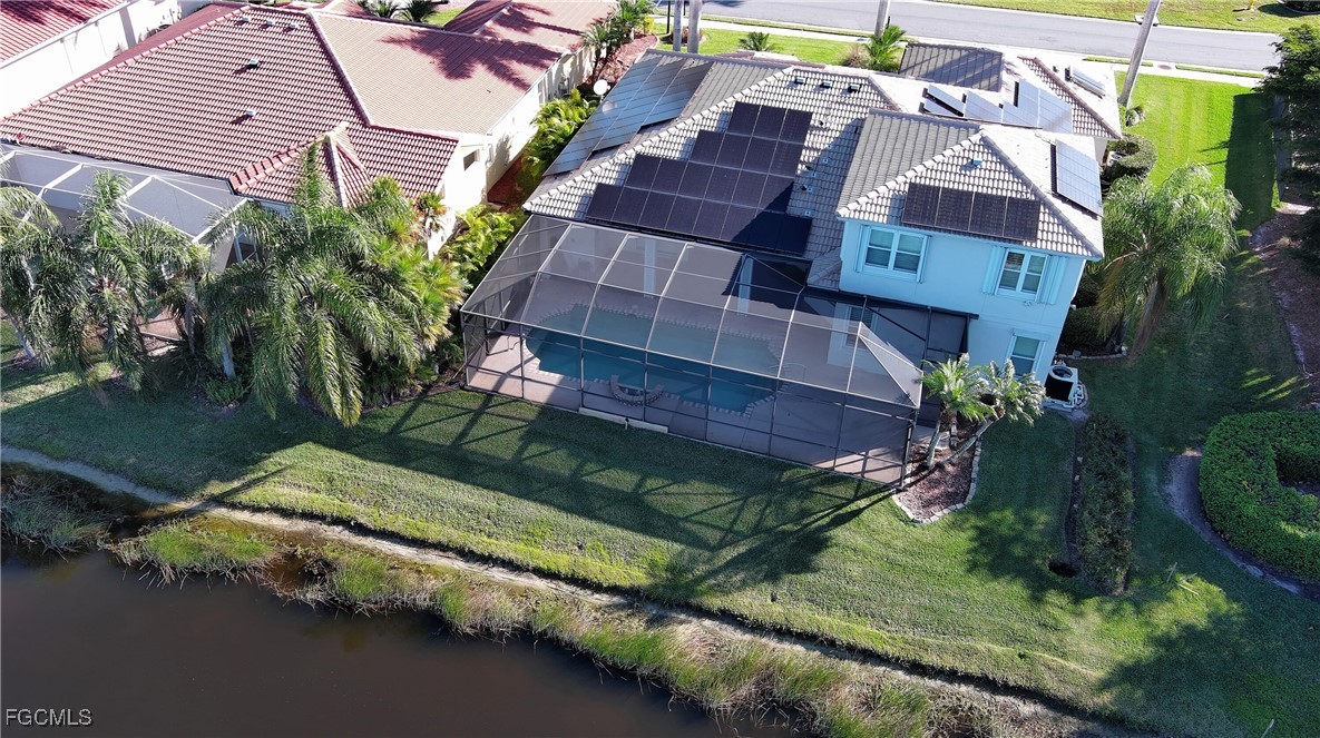 11066 Seminole Palm Way Fort Myers, FL 33966 - Photo 44 of 46 an aerial view of a house with a yard