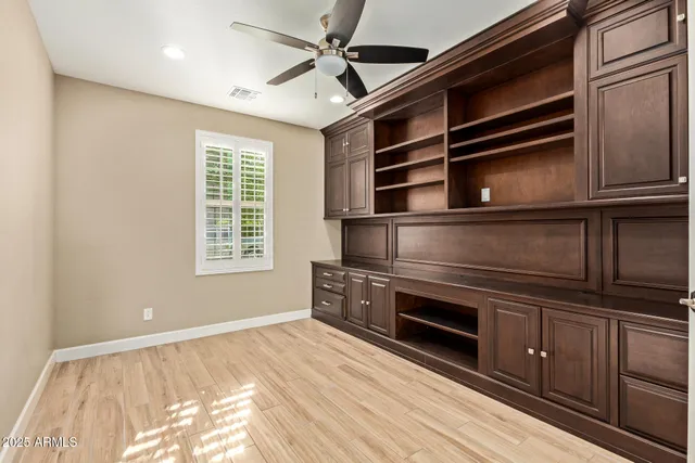 a kitchen with a stove and a microwave