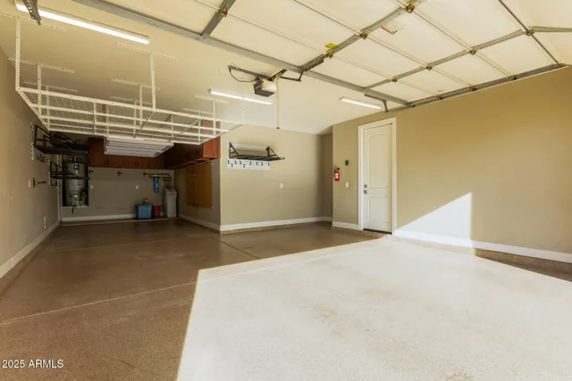 a view of a swimming pool with an outdoor space and seating area