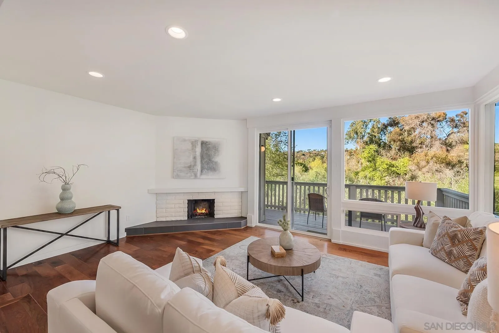 3040 Via De Caballo Encinitas, CA 92024 - Photo 15 of 39 a living room with furniture and a large window