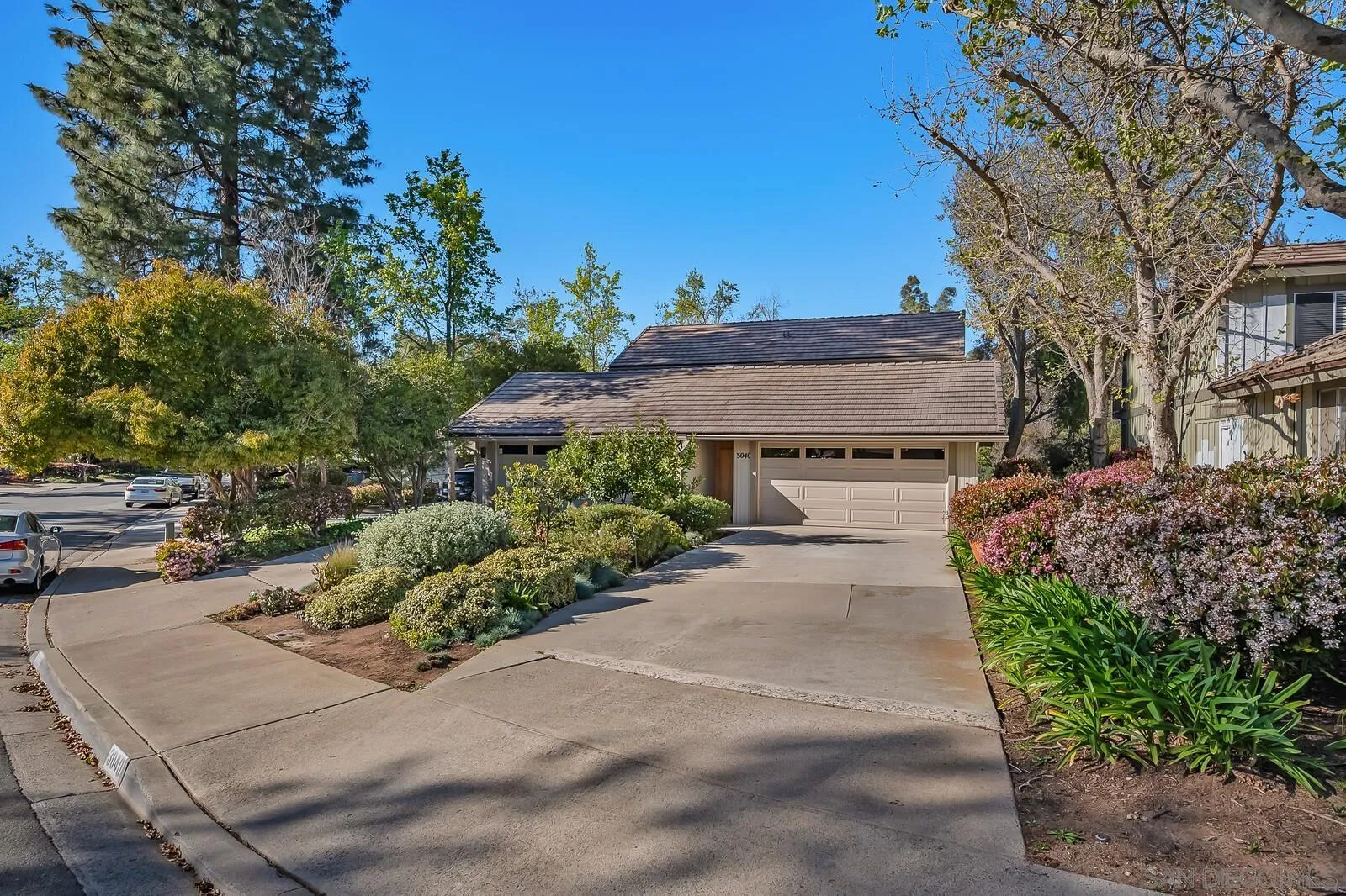 3040 Via De Caballo Encinitas, CA 92024 - Photo 2 of 39 a view of a house with a yard