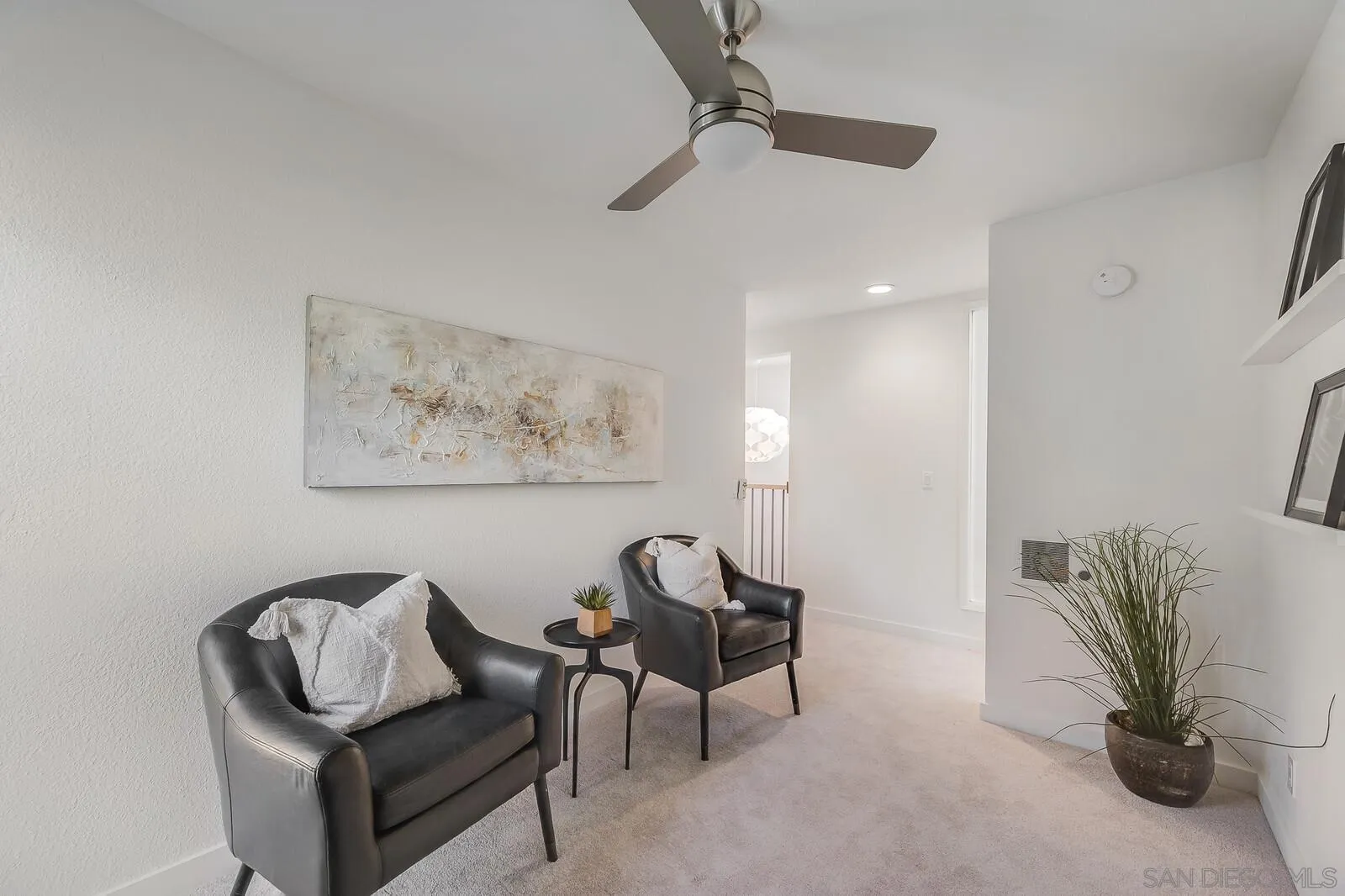 3040 Via De Caballo Encinitas, CA 92024 - Photo 27 of 39 a view of a livingroom with furniture and a couch