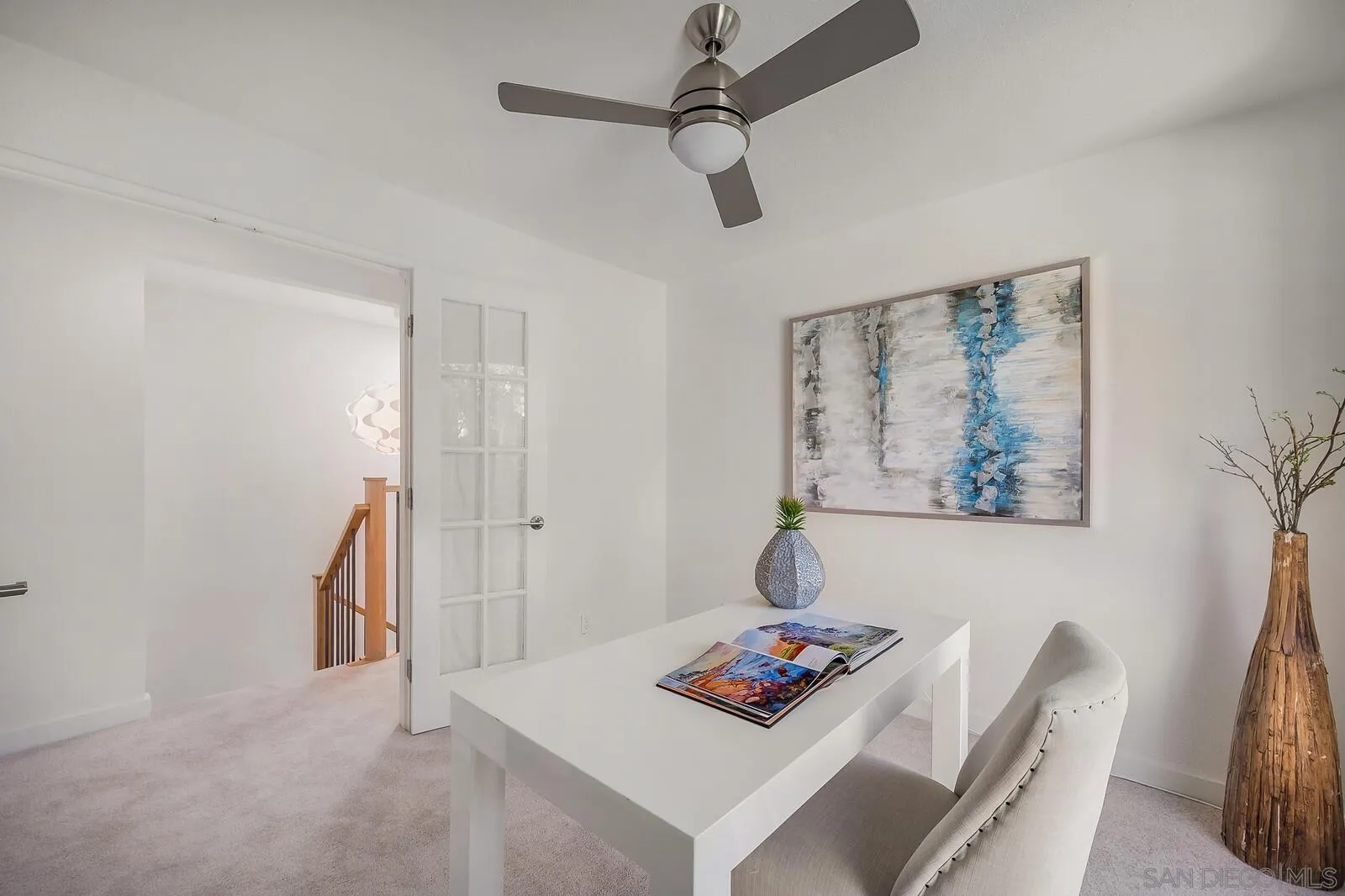 3040 Via De Caballo Encinitas, CA 92024 - Photo 29 of 39 a living room with furniture and a table
