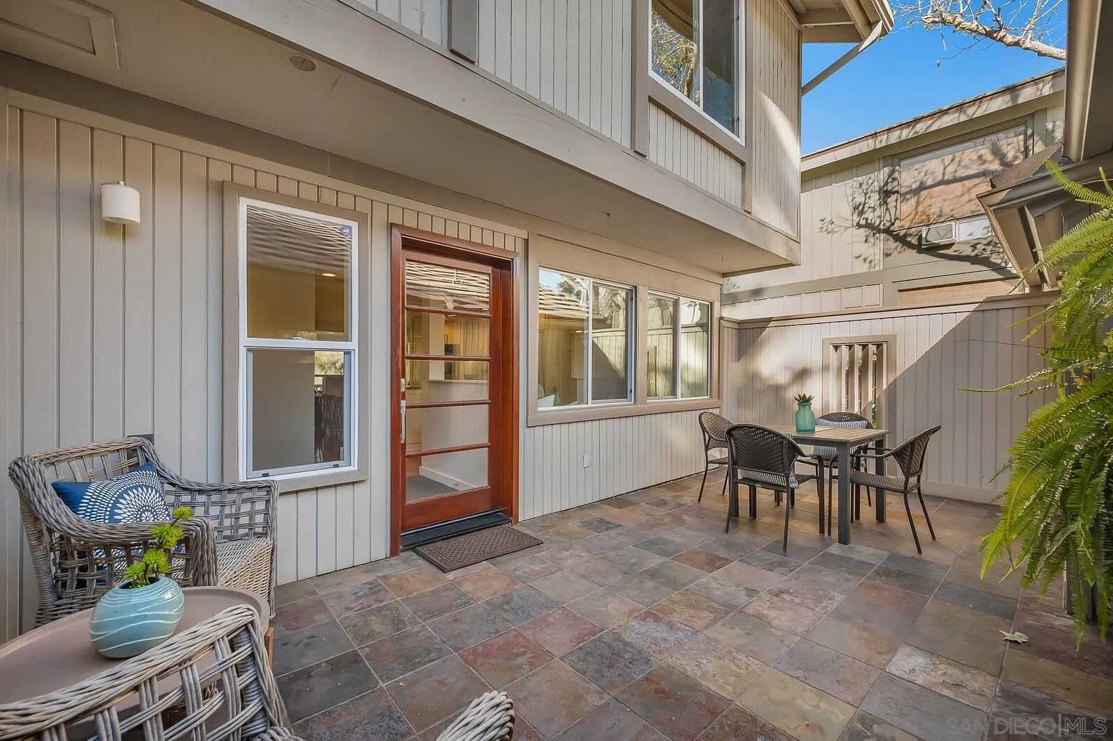 3040 Via De Caballo Encinitas, CA 92024 - Photo 3 of 39 a view of a house with outdoor seating area