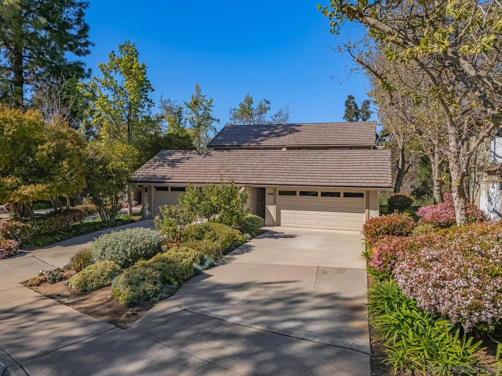 3040 Via De Caballo Encinitas, CA 92024 - Photo 36 of 39 front view of a house with a yard