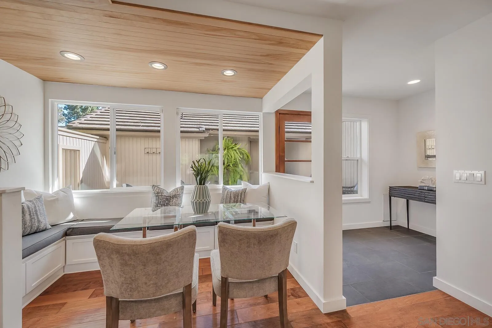3040 Via De Caballo Encinitas, CA 92024 - Photo 6 of 39 a dining room with furniture and wooden floor