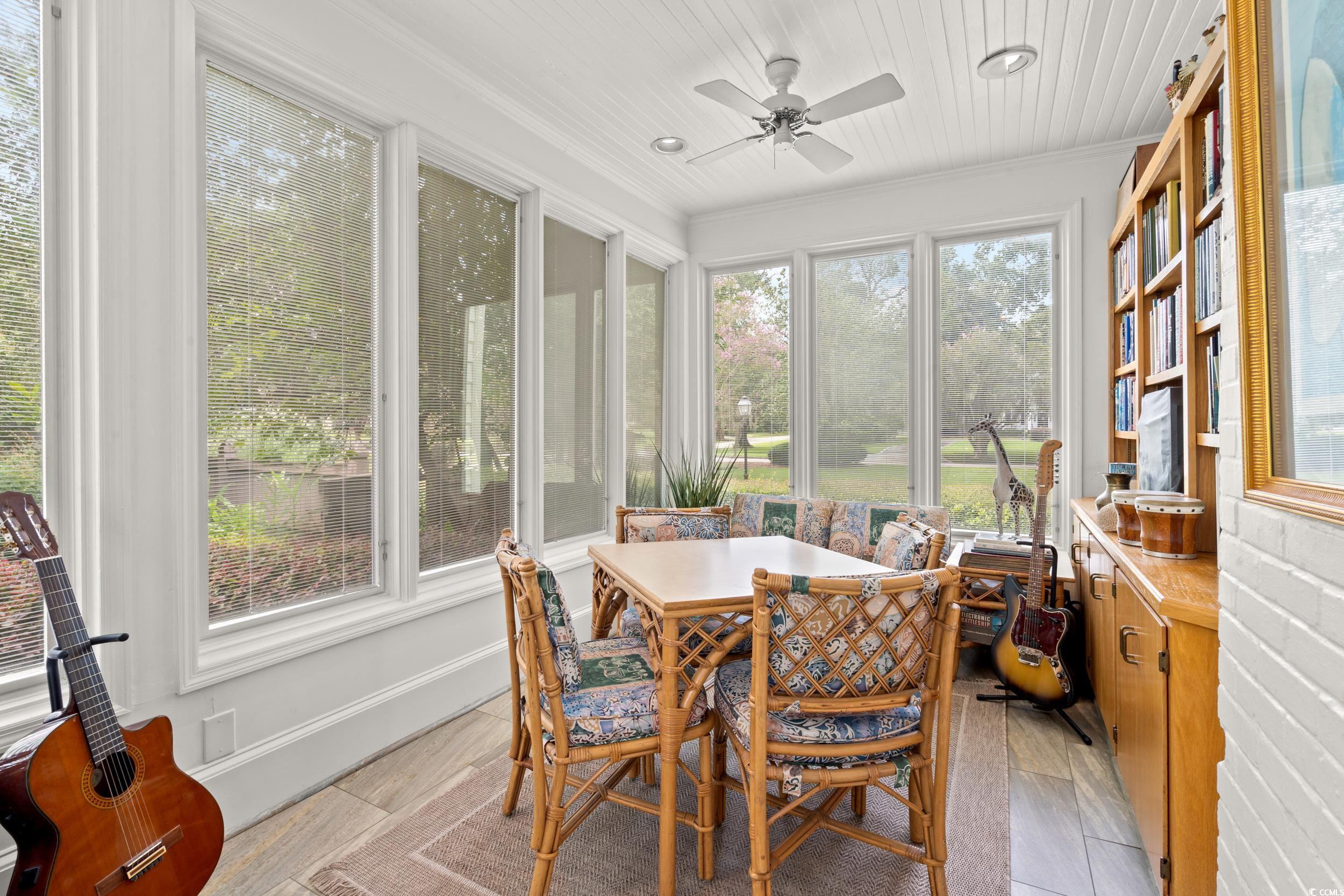 700 Lakeside Drive Conway, SC 29526 - Photo 16 of 40 Sunroom with wood finished floors and crown molding