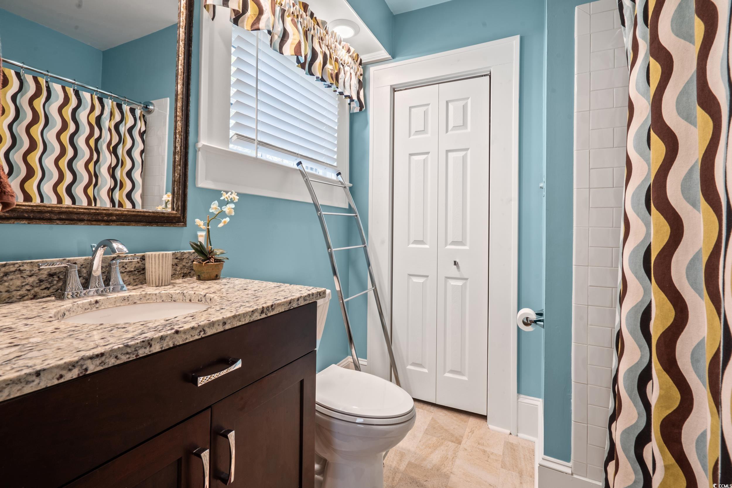 700 Lakeside Drive Conway, SC 29526 - Photo 24 of 40 Full bath with vanity, a closet, and a shower with curtain