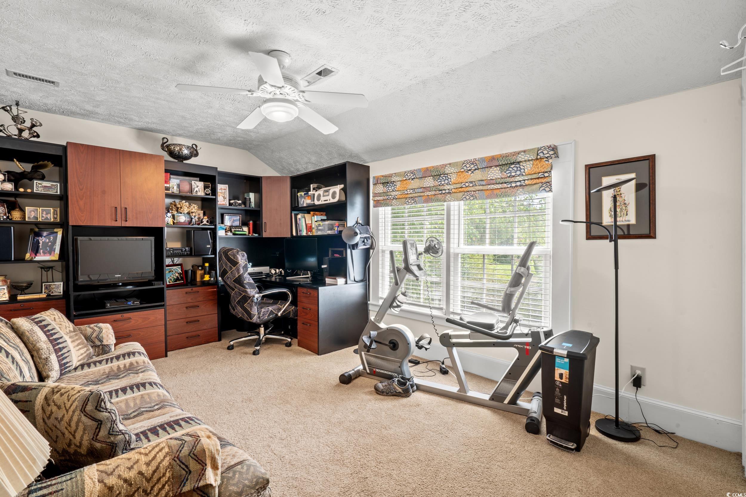 700 Lakeside Drive Conway, SC 29526 - Photo 28 of 40 Office featuring a ceiling fan, a textured ceiling, light carpet, and vaulted ceiling