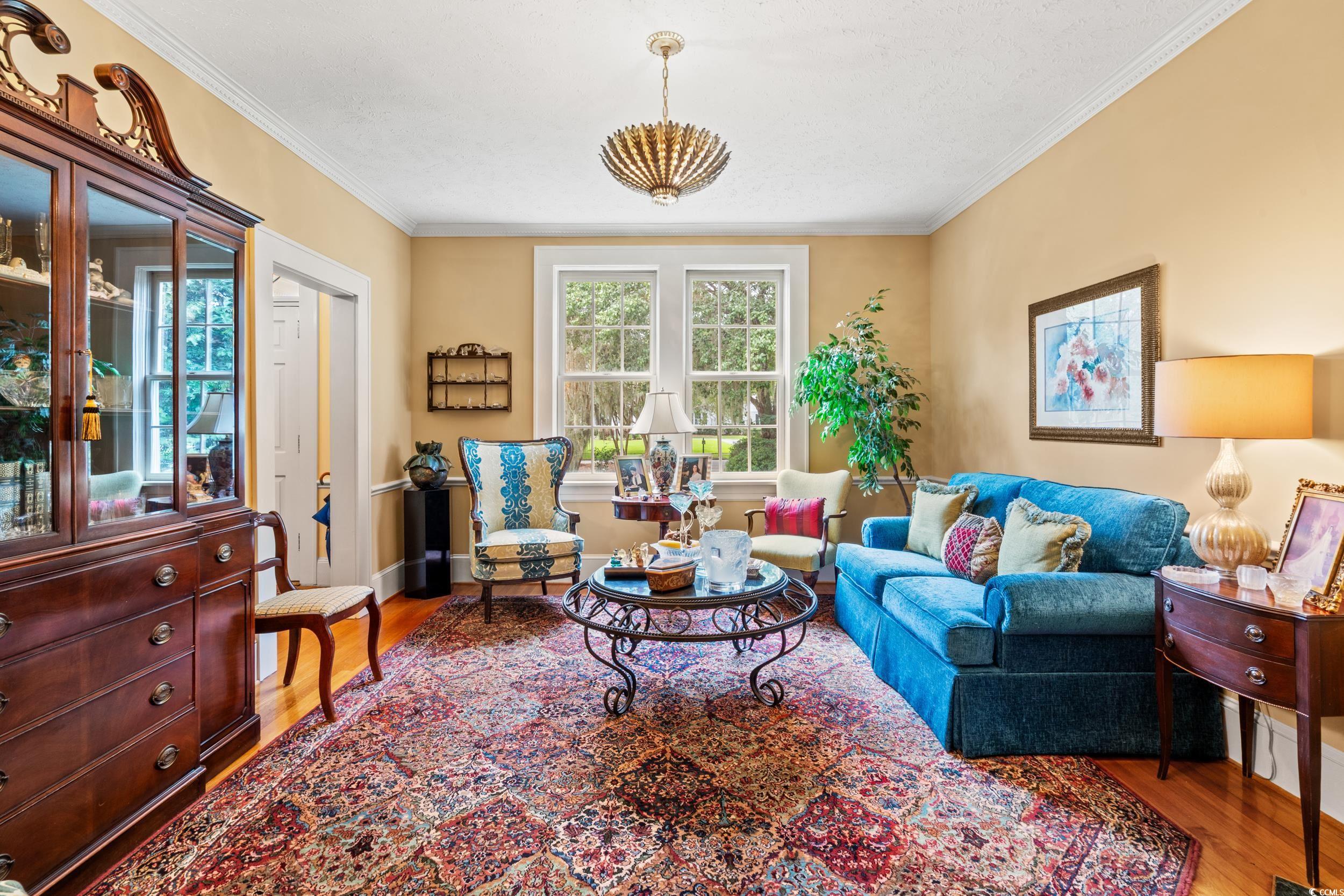 700 Lakeside Drive Conway, SC 29526 - Photo 5 of 40 Living room with wood finished floors and crown molding