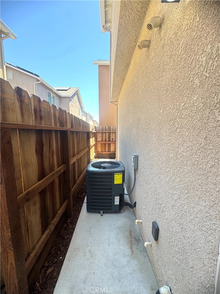 1339 Playa Del Rey Drive Merced, CA 95348 - Photo 42 of 48 a balcony with stairs and wooden floor