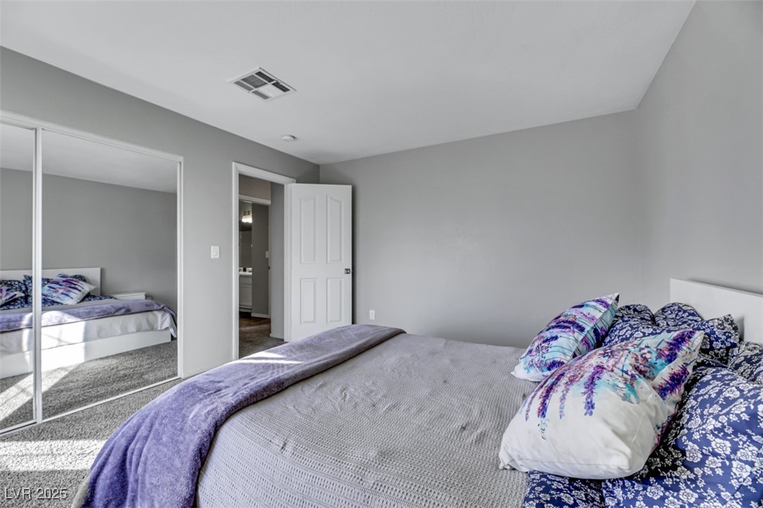 2907 Rio Sonora Court Henderson, NV 89074 - Photo 26 of 35 Bedroom with carpet flooring and a closet