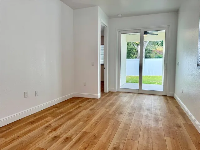 a view of an empty room and window