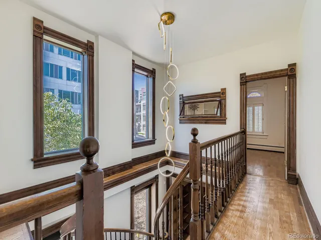 a view of a livingroom with furniture and windows