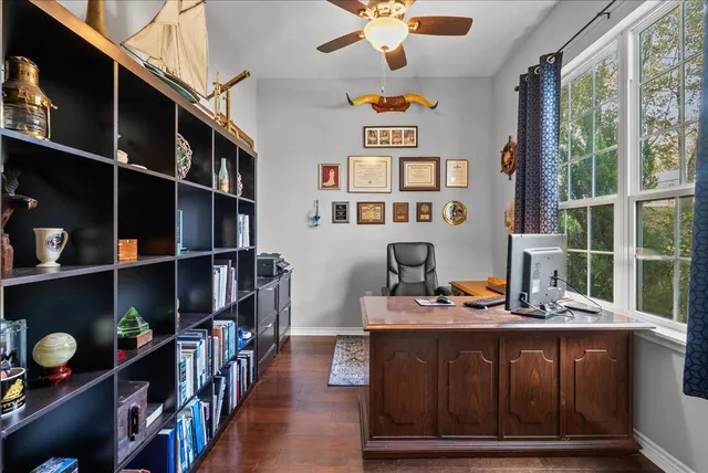 a room with furniture cabinets and window
