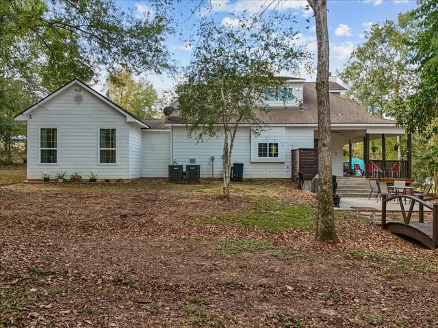 a backyard of a house with seating space