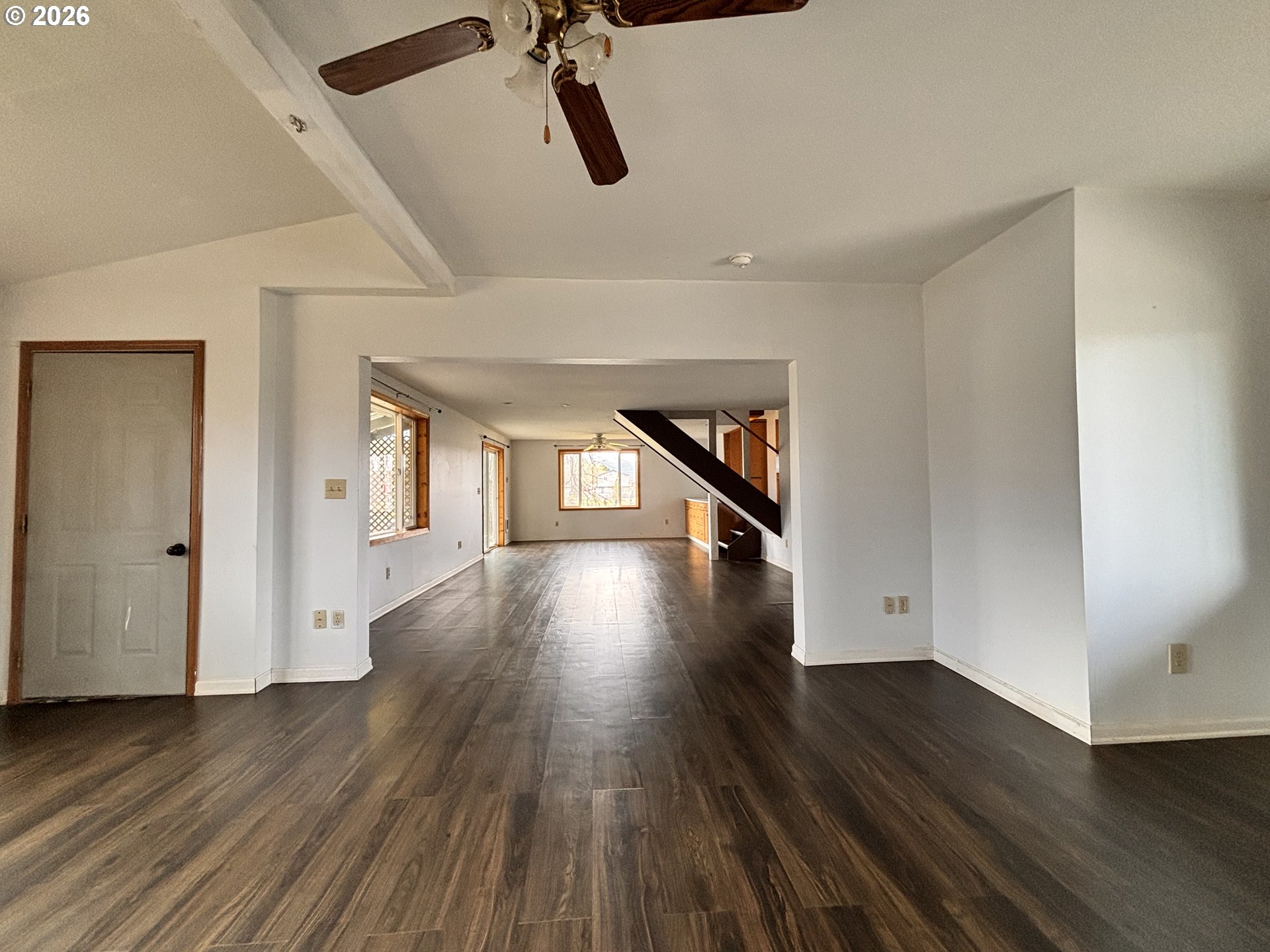 302 Southwest Depot Street Enterprise, OR 97828 - Photo 17 of 22 a view of a hallway with wooden floor and staircase