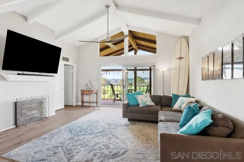 1944 Fairway Cir Drive San Marcos, CA 92078 - Photo 1 of 38 a living room with furniture a flat screen tv and a fireplace